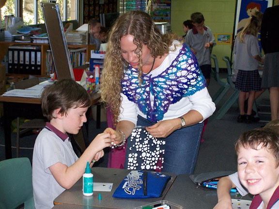 Vanessa our Marketing guru helping students make their Gratitude Coasters