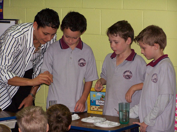 Janet our CEO with boys from Kimberley Park State School